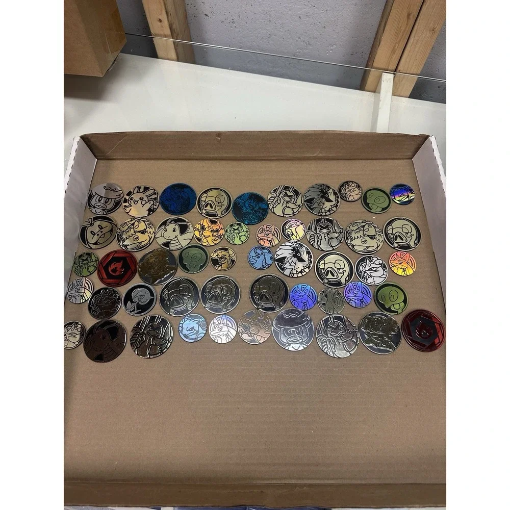 Pokémon TCG - 50 Official Coin Lot Mixed Years & Styles, Varying‎ Condition!